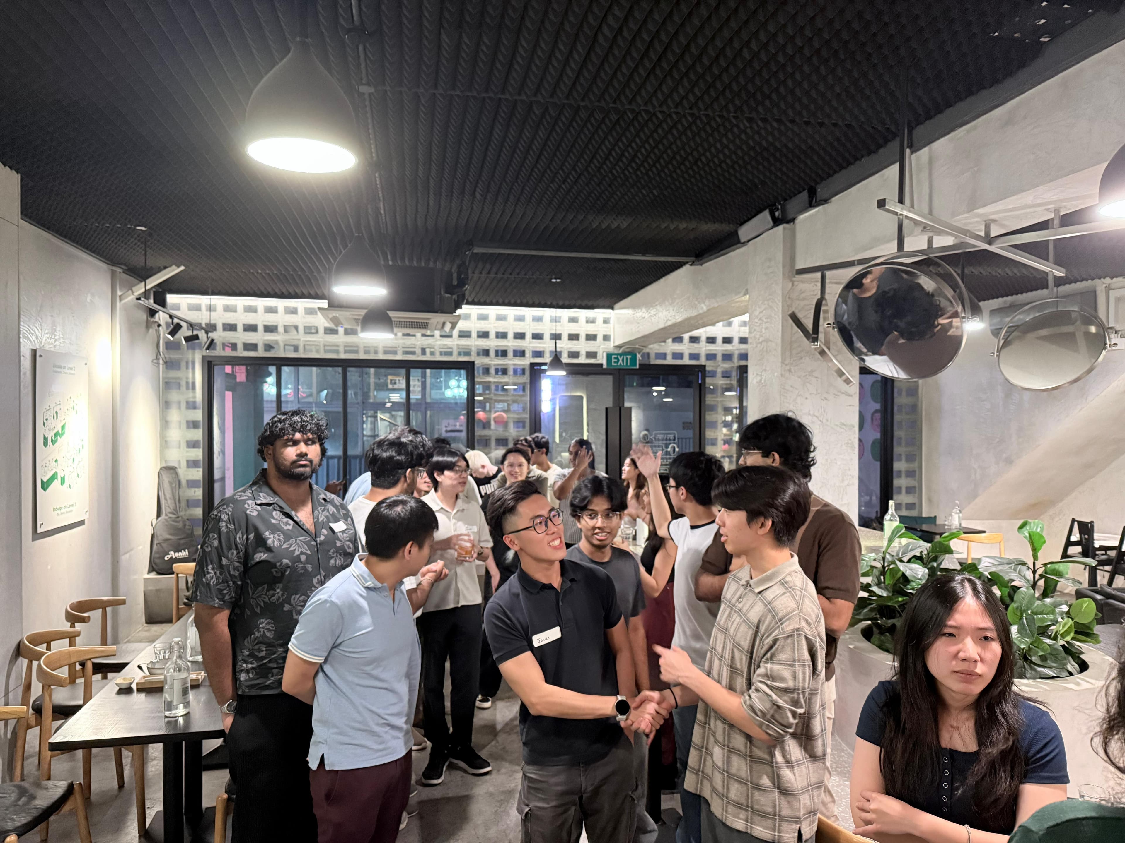 Entrepreneurs brainstorming together in a modern meeting space